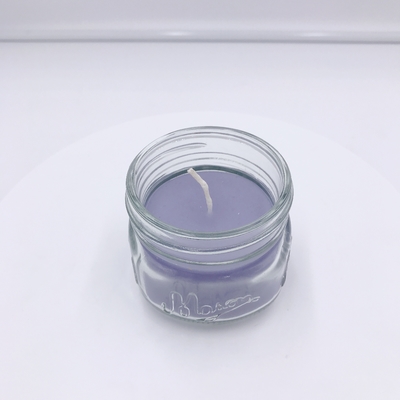 Jasnofioletowa świeca zapachowa Aromatherapy Associates do masażu